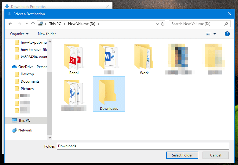 select the newly-created Downloads folder as the default Downloads folder