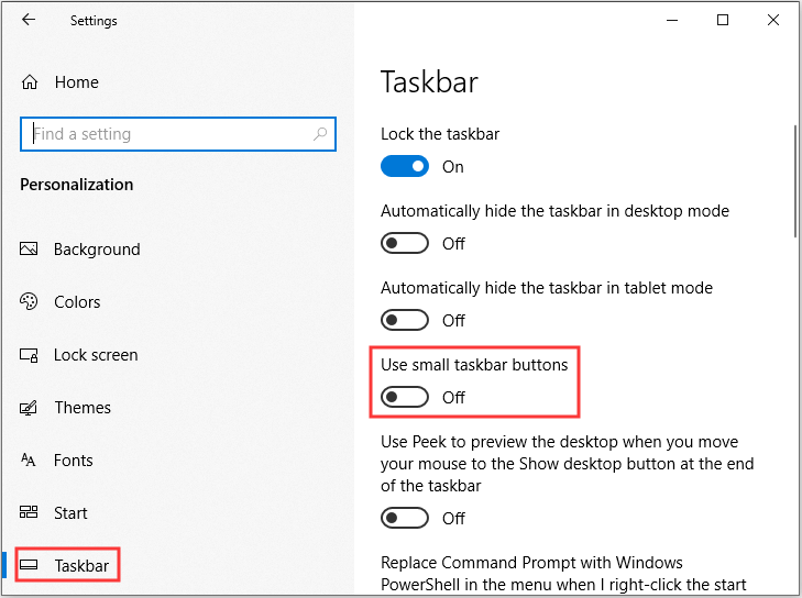 desactivar la opción Usar botones pequeños de la barra de tareas